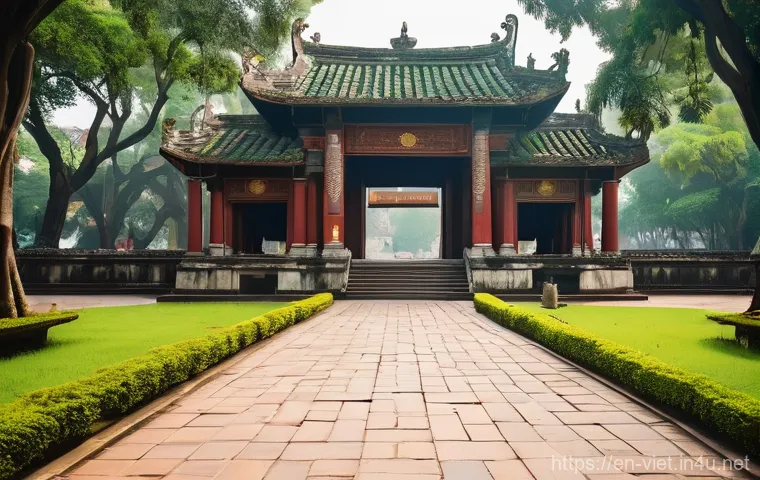 베트남 하노이 문묘 - **A Serene Gateway to Ancient Knowledge**
    A wide-angle shot of the main entrance to the Temple o...